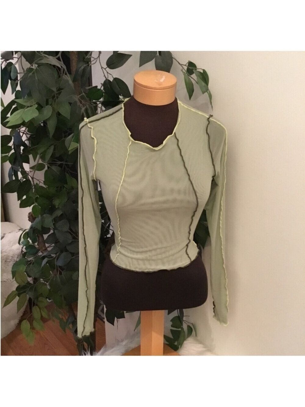 Bailey Rose Woman’s Small sheer long sleeve crop with outside stitching